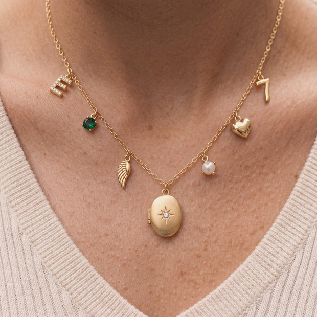 The mini charm necklace worn