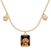 Mini charm necklace with a pet portrait charm named Max between a paw print and a heart