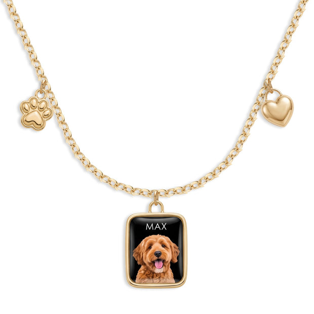 Mini charm necklace with a pet portrait charm named Max between a paw print and a heart